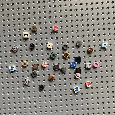 Lego lot of 30 pieces of 1x1 tiles square and round with printed decorations - Image 1 of 3