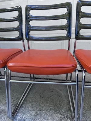 4 sillas MCM Lucite ahumadas con marco cromado asientos naranjas Foto 1 de 4