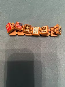 Vintage Sammlerstück USA Militär dehnbares Armband Marine Armee - Bild 1 von 2