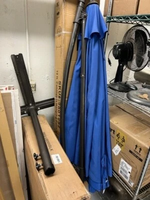 Blue and orange patio umbrella's 6ft tall w/ base - Image 1 of 3