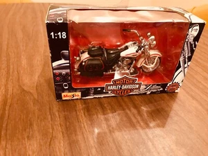 Motocicleta Harley Davidson Maisto Hertiage Springer FLSTS escala 1:18 - Imagen 1 de 8