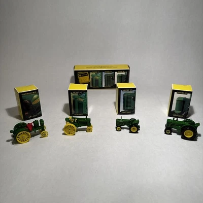ERTL #5523 Juego de juguetes histórico John Deere 1988 vintage de 4 piezas de metal fundido a presión NUEVO Foto 1 de 4