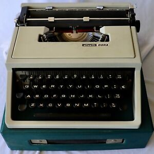 Vintage  Retro Italian Olivetti Dora typewriter with Case 