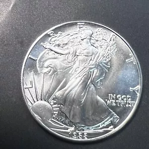 1988 AMERICAN SILVER EAGLE DOLLAR ~ APPEARS TO HAVE A SMALL EDGE FLAW AS STRUCK! - Picture 1 of 3