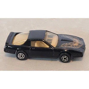 MAISTO 1/64 PONTIAC FIREBIRD TRANS AM Black / Tan Interior / Gold Diecast Car - Picture 1 of 12