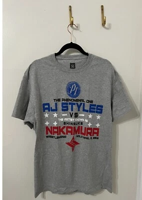 Camiseta AJ Styles Vs Shinsuke Nakamura WWE L Grande Wrestlemania 2018 34 Foto 1 de 4