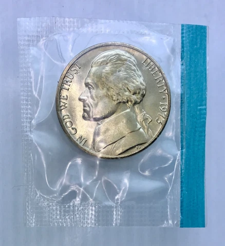 1973 UNCIRCULATED 5c Jefferson Nickel FULL STEPS Lt gold toning sealed in cello Cover