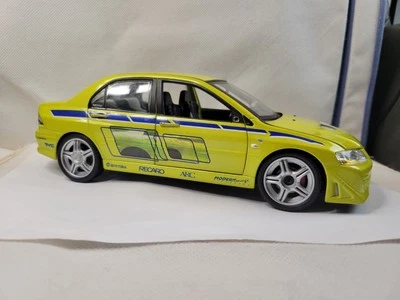 The Fast And The Furious 1:18 2002 Mitsubishi Lancer Evo VII Yellow. *Read - Image 1 of 4