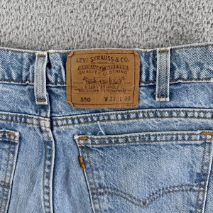 Pantalones de mezclilla vintage Levis 550 para hombre 31x30 ajuste azul lengüeta naranja hechos en EE. UU. años 90 bonito desvanecimiento - Imagen 1 de 12