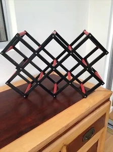 Folding Black, Red Plastic Wine Rack Concertina Accordion Expanding Collapsible - Picture 1 of 8