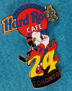 TORONTO 24º ANIVERSARIO HOCKEY SOBRE HIELO DISCO PALO LLAMAS CALIENTES Hard Rock Café PIN LE - Imagen 1 de 1