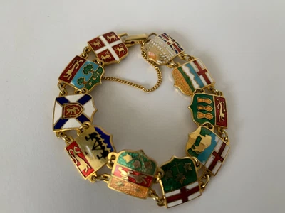 Esmalte Vintage~Pulsera Metal Oro 10 Banderas Canadienses~Provincias 7" L Souvenirs Foto 1 de 4