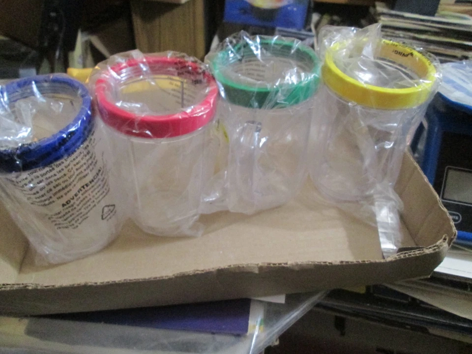 4 magic bullet blender handled cups with color rings 4 colors NEW OPEN BOX - Image 1 of 1