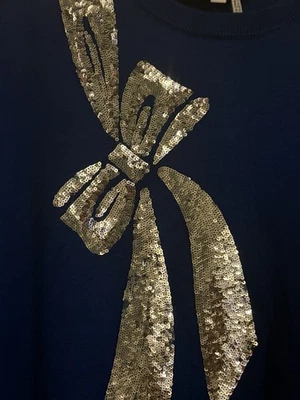 Suéter con lazo de lentejuelas DKNY Foto 1 de 3