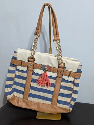 Cartera de mano Aldo a rayas con borla Foto 1 de 2