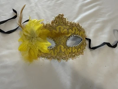 Yellow Masquerade Mask With Feathers And Flowers Tie On Mardi Gras - Image 1 of 3