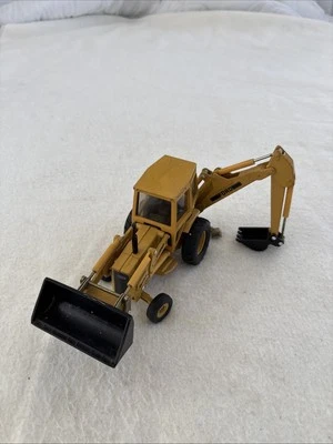 1/32 Ertl Ford 555A Backhoe/front Loader W/ Outriggers. Toy (No Box) - Image 1 of 4
