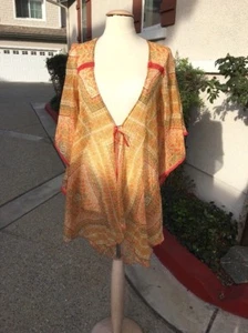 ¡NUEVO! Poncho envolvente transparente BCBGeneration estampado kimono top, O/S - naranja especiado - Imagen 1 de 7