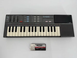 Casio PT-87 Mini Keyboard & ROM Pack RO-551 World Songs Lot Tested & Works Great - Picture 1 of 14