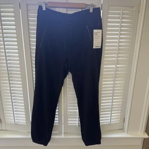 Nuevo con etiquetas Pantalones deportivos Athleta negros Recover Bounce Back medianos $89 bolsillos con cremallera - Imagen 1 de 4