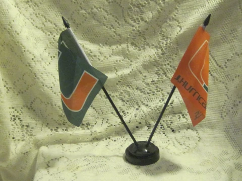 UNIVERSITY OF MIAMI HURRICANE  two flag desk set one orange one green new sealed Cover