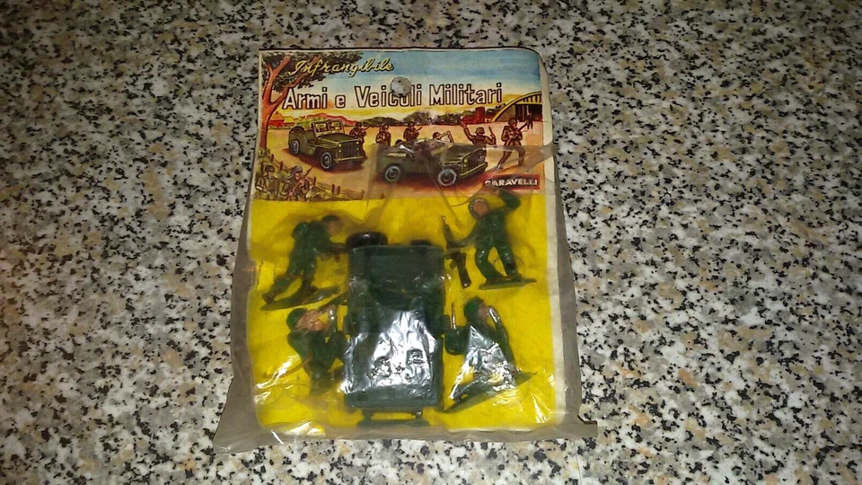 BOX KIT SET CONFEZIONE SOLDATINI ARMI VEICOLI MILITARI BARAVELLI ANNI 60 BLISTER - Immagine 1 di 1