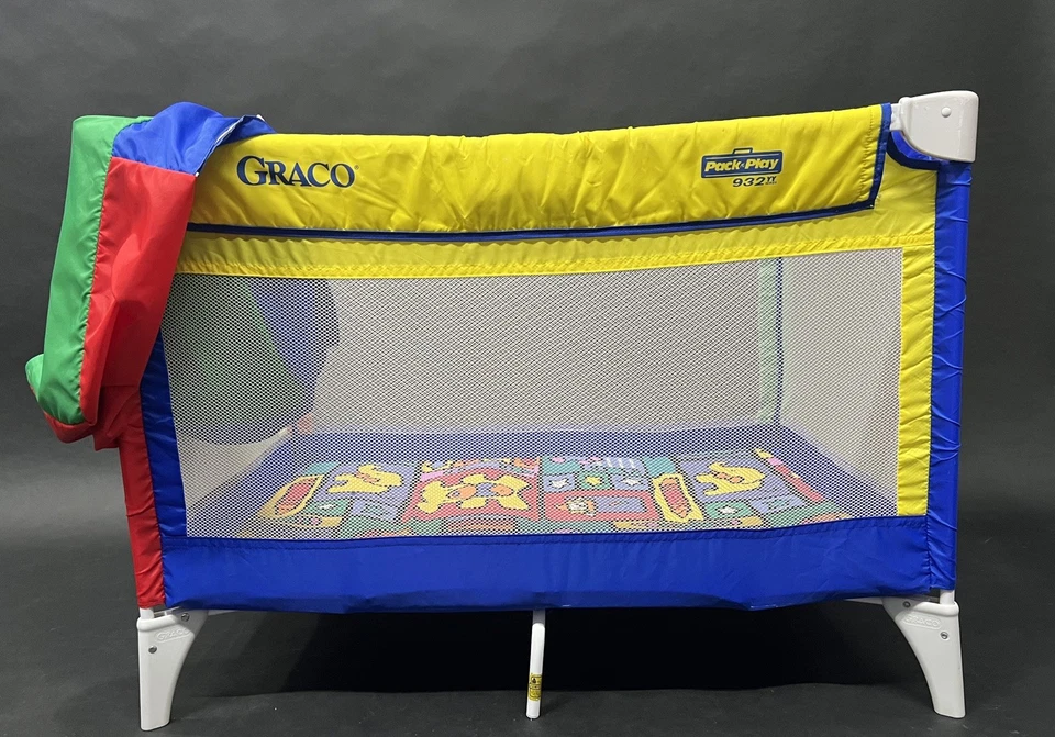 Cuna de viaje retro para bebé Graco Pack N Play roja, amarilla, verde, azul de colección años 90 con bolsa Foto 1 de 4