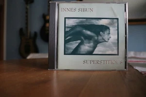 Innes Sibun - Superstitious - Bild 1 von 2