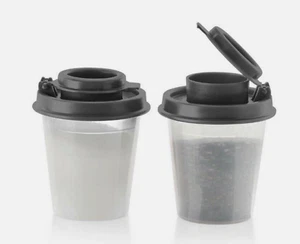 Tupperware S&P Set Liquid Tight Seals Midgets Salt & Pepper Shakers Black New - Picture 1 of 3
