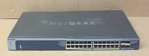 Netgear ProSAFE M4100-24G-POE+ switch 24 porte layer 2+ 10/100/1000 PoE+ GSM7224P - Foto 1 di 10