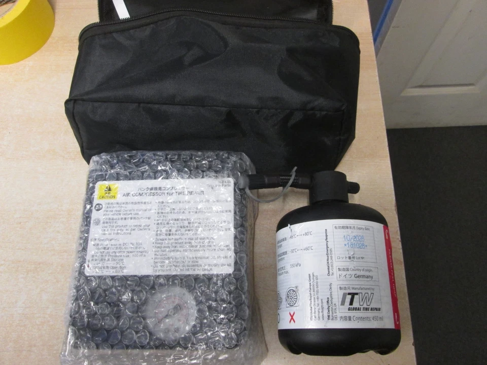 GENUINE TOYOTA TYRE REPAIR KIT PUMP COMPRESSOR SEALANT BOTTLE BAG SET 10-2028 - Image 1 of 1