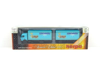 HERPA CAMION MERCEDES AVEC REMORQUE BIERE LOWENBRÄU REF. 182119 ECHELLE H0 1/87 - Photo 1/4