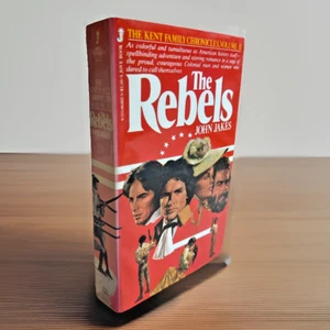 The Rebels (1982) ~ John Jakes ~ *VERY GOOD* ~ *UNREAD* ~ Paperback - Picture 1 of 5