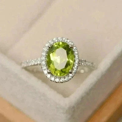 2.20 克拉椭圆形切割实验室创建的 Peridot 光环订婚戒指 14K 镀白金 — 第 1/4 张图片