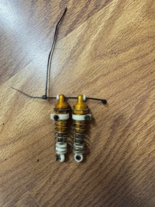 Team Associated Rc10 Buggy Front Shocks Gold #7-27 - Picture 1 of 2