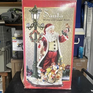 Weihnachtsmann mit LED Lampenmast Costco 2 Meter hoch - Bild 1 von 5