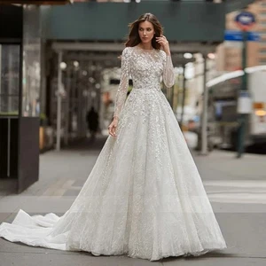 Abiti da sposa eleganti A-Line scollo a O maniche lunghe pizzo applicazioni abiti da sposa - Foto 1 di 10