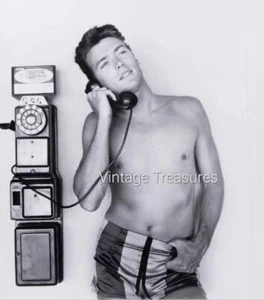 American Actor Clint Eastwood Makes a Phone Call Photo Print Poster - Picture 1 of 1