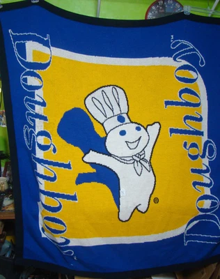 Manta vintage Pillsbury Doughboy azul/amarillo/blanco aprox 57” X 60” Foto 1 de 4