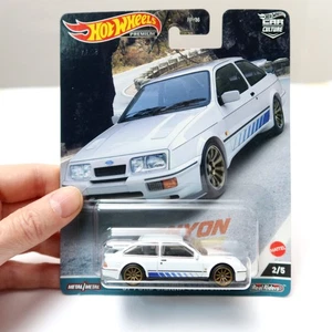 HOT WHEELS '87 FORD SIERRA COSWORTH CANYON WARRIORS HKC54 NUOVA SIGILLATA - Foto 1 di 8