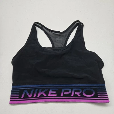 Sujetador deportivo Nike para mujer M negro con detalles en rosa y azul DRI FIT inalámbrico Foto 1 de 4