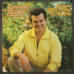 CONWAY TWITTY: georgia keeps pulling on my ring MCA 12" LP 33 RPM - Picture 1 of 2