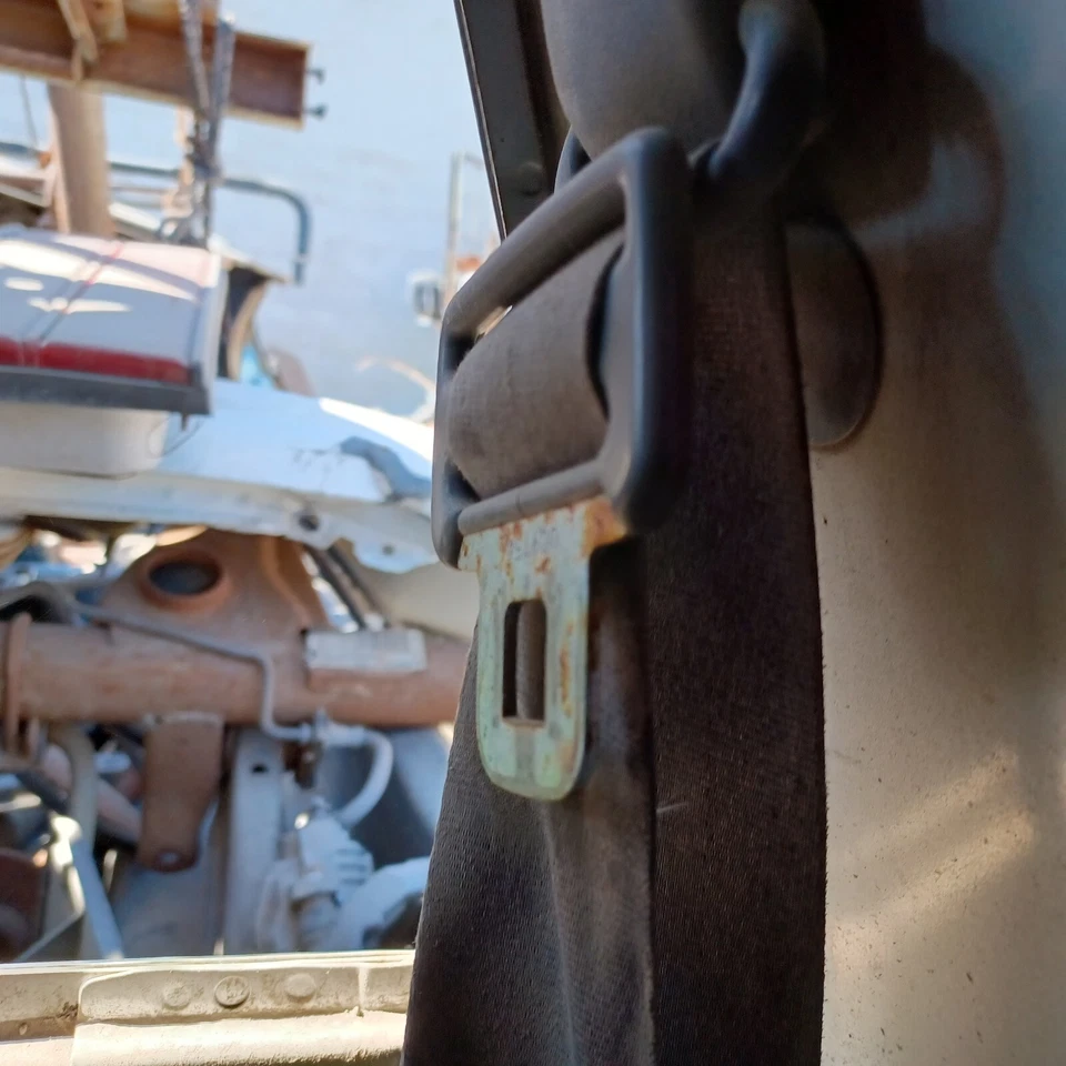 88 Toyota pickup regular cab Left Seat Belt retractor gray over shoulder - Image 1 of 4