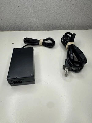 Adaptador de fuente de alimentación compacto original Canon CA-570 S - Cargador de videocámara original Foto 1 de 3