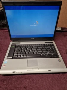 Toshiba Equium A100-549 Retro Laptop Power On Tested Intel Celeron M 1.4GHz - Picture 1 of 13