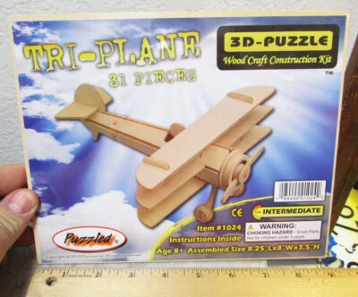 NEW Wood 3D Tri Plane Puzzle 31 pieces 8 x 3 x 8 inches, fun wood craft project - Image 1 of 2