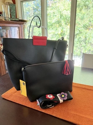 Bolso Cirque du Soleil magnético con bolso interior y correa extra para el hombro negro rojo Foto 1 de 4