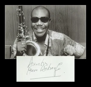 Manu Dibango (1933-2020) - Saxophoniste - Page de livre d'or signée - Paris 1985 - Picture 1 of 3