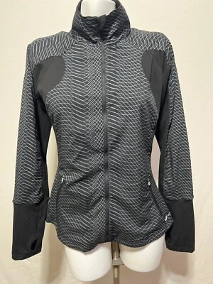 Chaqueta atlética activa negra grande con cremallera Asics para mujer Foto 1 de 4