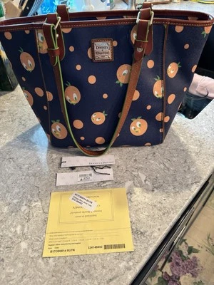 Dooney & Bourke Disney Tote Bag Purse Orange Bird, used, some blemishes - Image 1 of 4